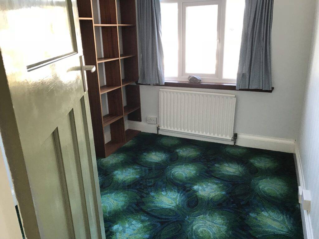 A bedroom cleared of all furniture and household effects. Admiring the funky 1970's carpet at this Erdington home. Berkeley house Clearance in Erdington