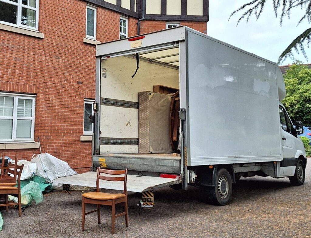 Terry's van parked outside flat in Wylde Green, Sutton Coldfield. Furniture and other household items ready to load onto van. Bereavement clearance services. Wylde Green Sutton Coldfield
