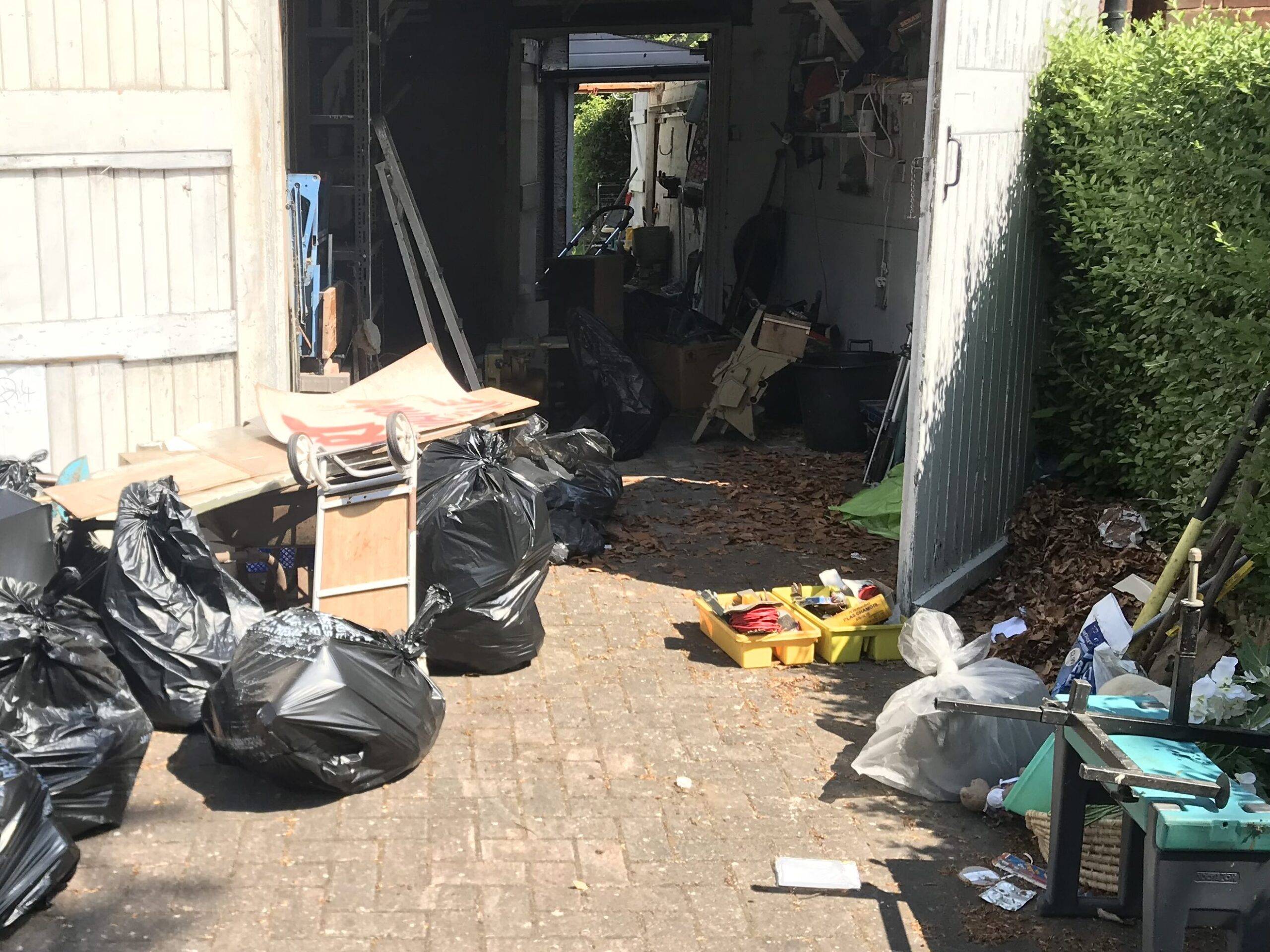 Berkeley House Clearance in Mere Green, Sutton Coldfield. House clearance services in progress/ rubbish removal. Rubbish bagged and ready to load onto the van. General household items outside and in the garage areas ready to be cleared. Ready for removal, recycling and disposal. 