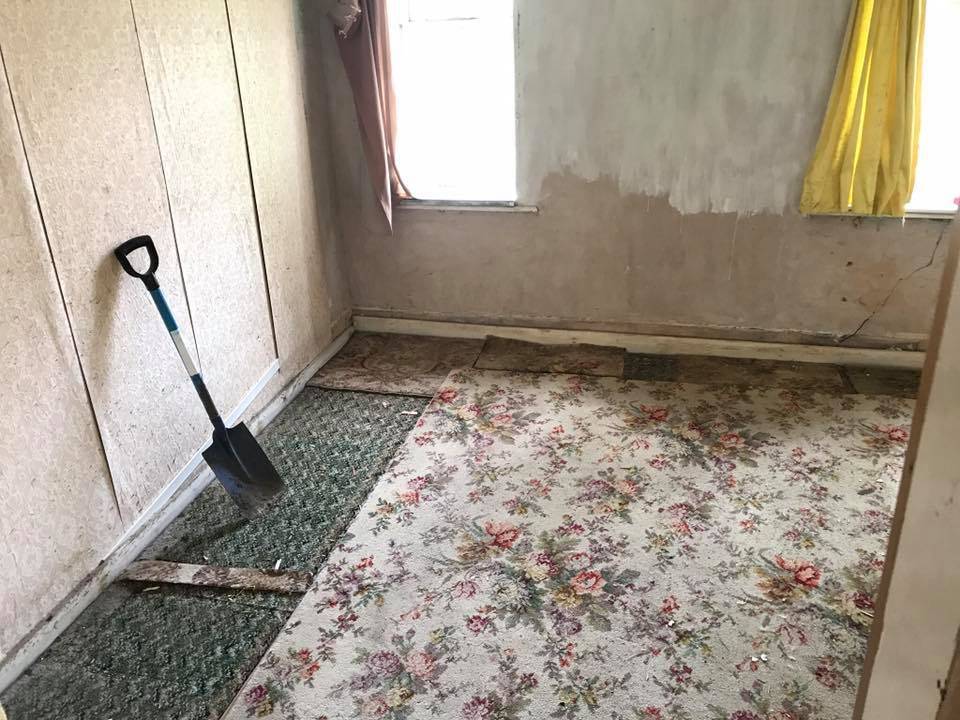 A bedroom cleared at a home in Wylde Green, Sutton Coldfield. Showing space in bedroom which was used to scrape carpets. Berkeley House Clearance Bereavement and hoarded home clearance services.