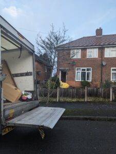 A house clearance in Birmingham. Terrys van parked at home in Erdington. Showing items that have been cleared from property loaded on van and ready to be recycled or donated to local charity